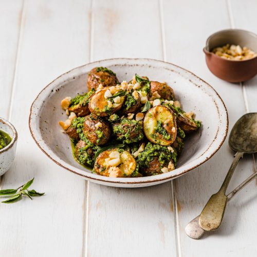 Roasted Potato Salad with Warrigal Greens and Maple-Caramelised Macadamia Pesto